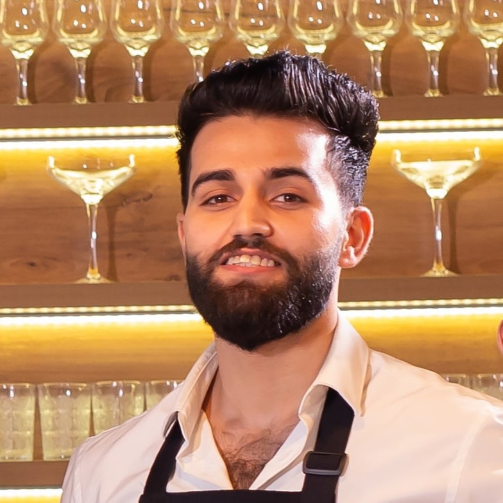 happy-chef-his-colleague-standing-kitchen-looking-camera-food-restaurant-concept